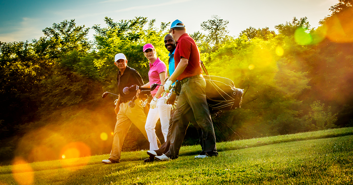 Golfers walking on the course